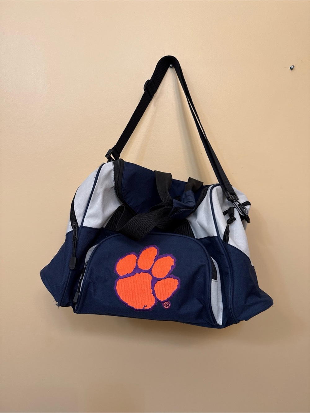 Navy Duffel with Bright Orange Paw Logo